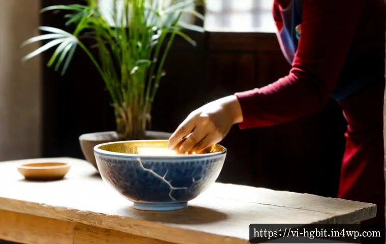 Home 17 회복탄력성을 위한 인생의 교훈 배우기 - Photorealistic Vietnamese woman in her late 30s calmly repairing a cracked ceramic bowl with gold-co...